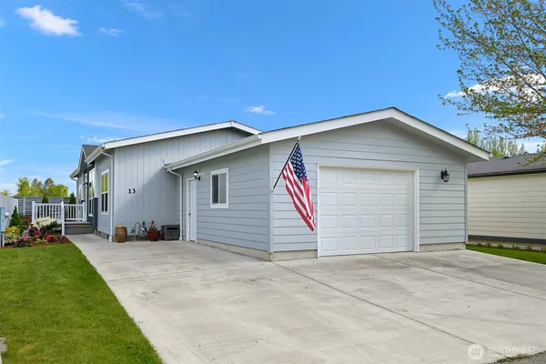 a house with yard in front of it