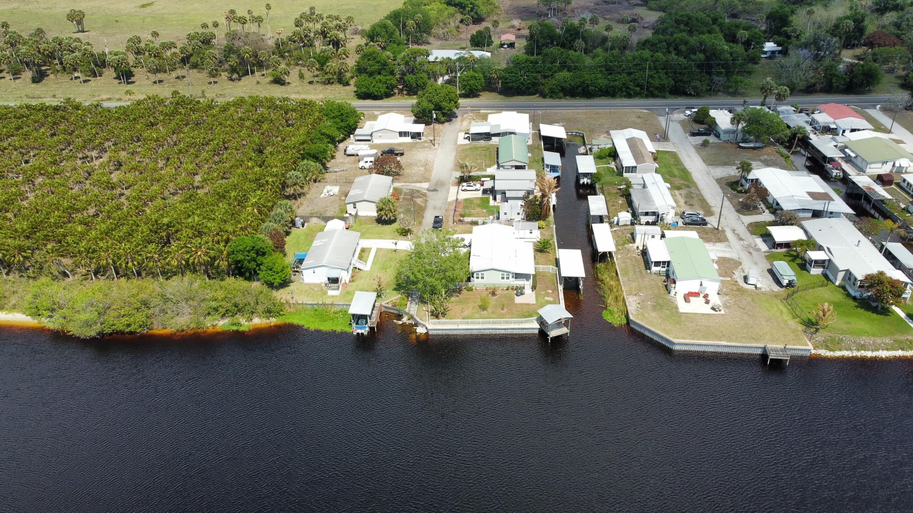 7902 Southeast 95th Trail Okeechobee, FL 34974 - Photo 3 of 36 an aerial view of multiple house