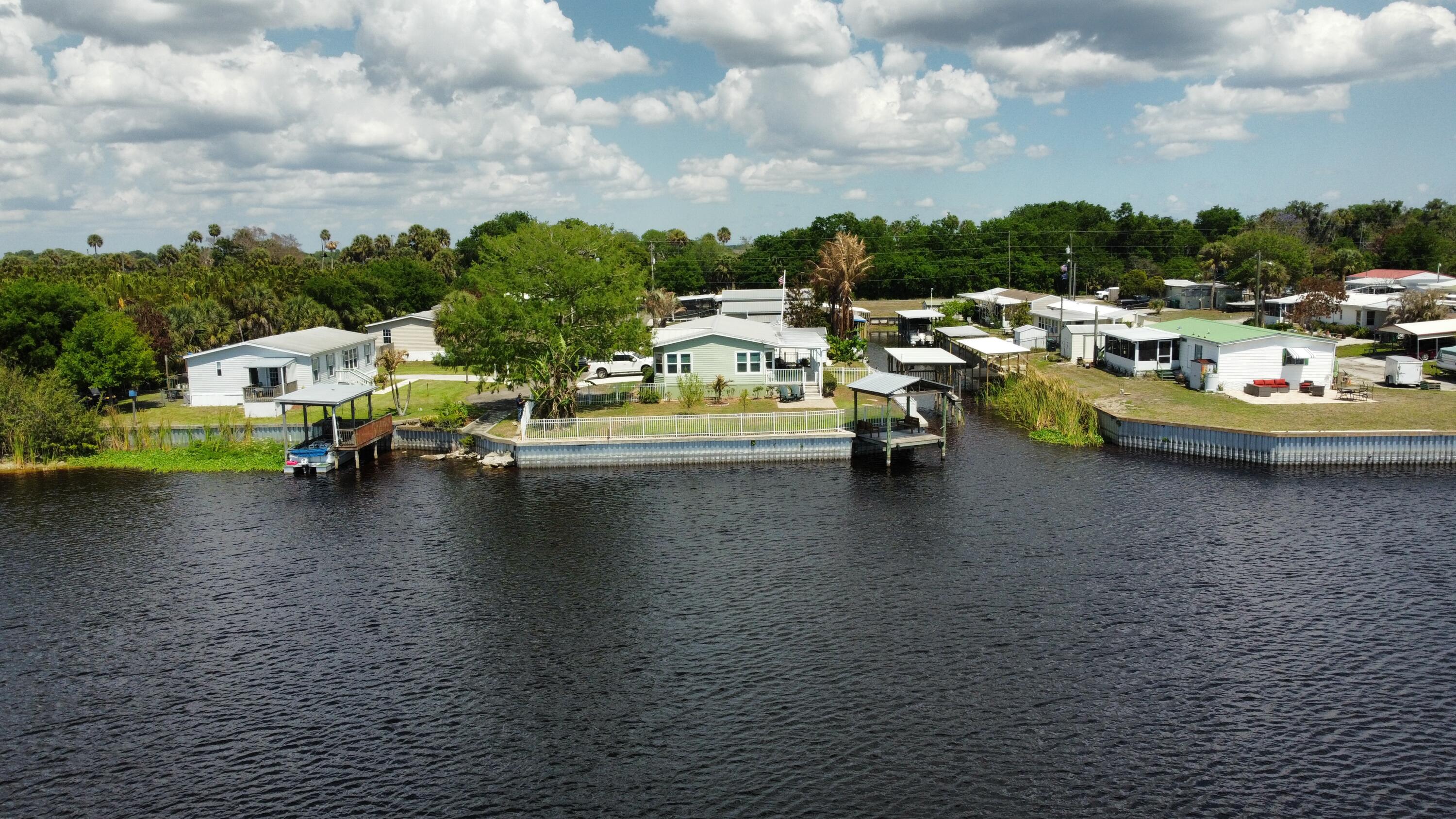 7902 Southeast 95th Trail Okeechobee, FL 34974 - Photo 34 of 36 a view of a lake view