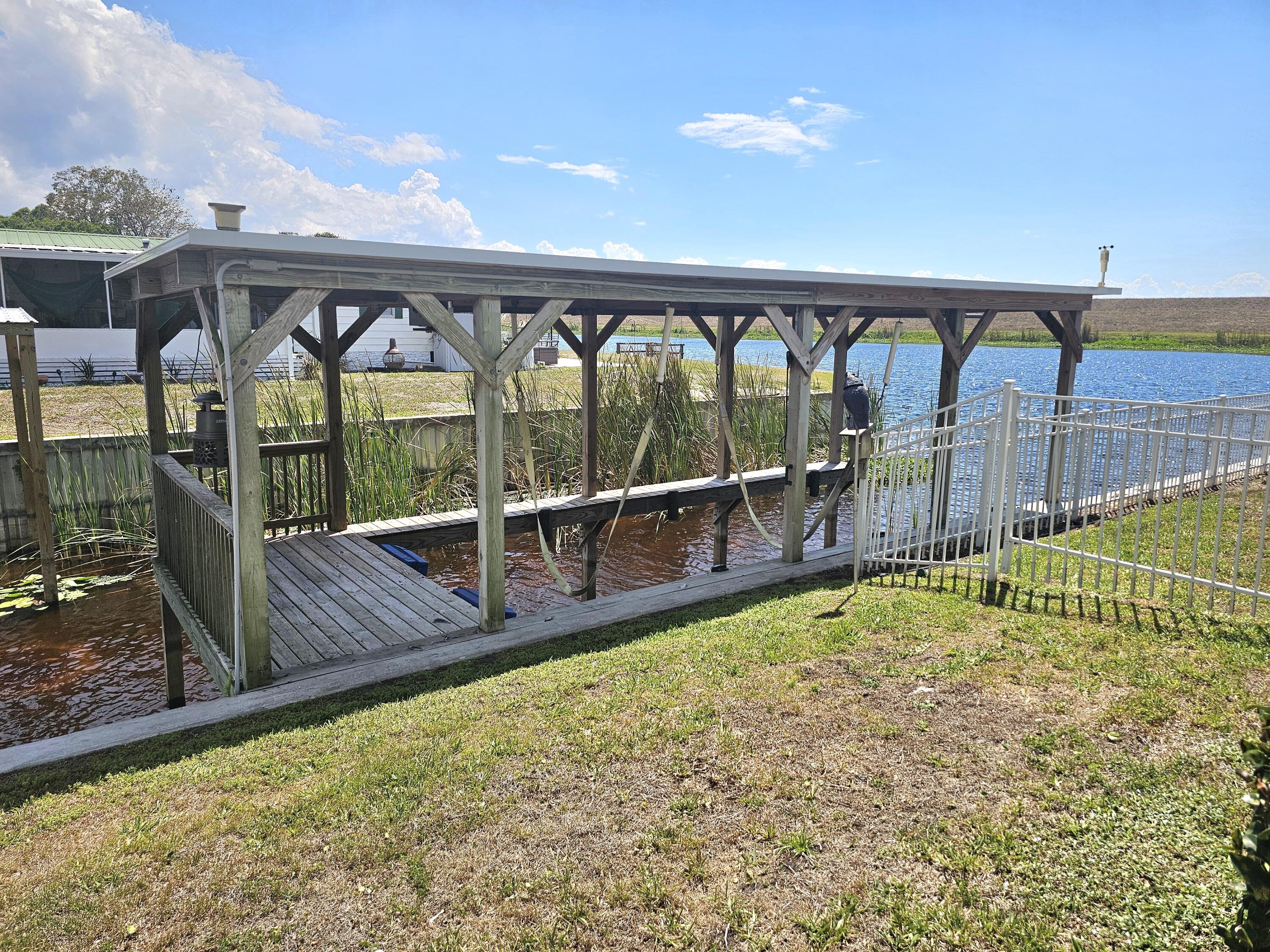 7902 Southeast 95th Trail Okeechobee, FL 34974 - Photo 5 of 36 a view of swimming pool