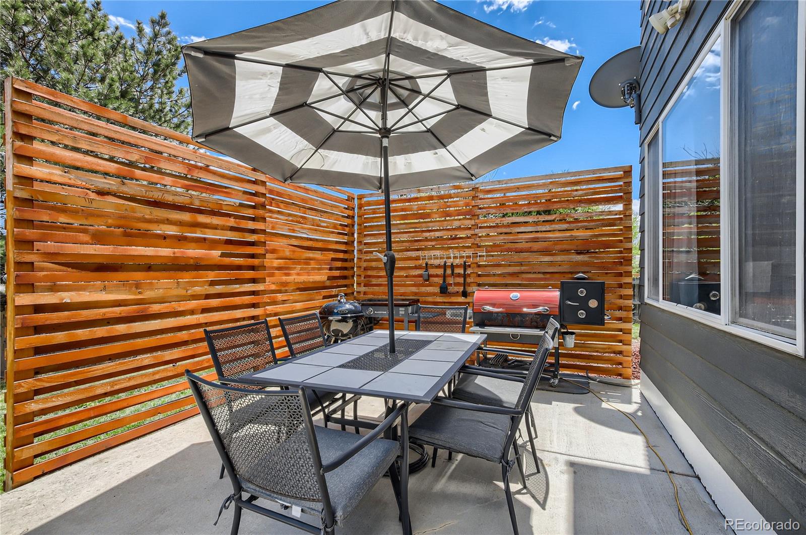 8481 West 95th Drive Westminster, CO 80021 - Photo 24 of 28 a view of a outdoor seating area with furniture