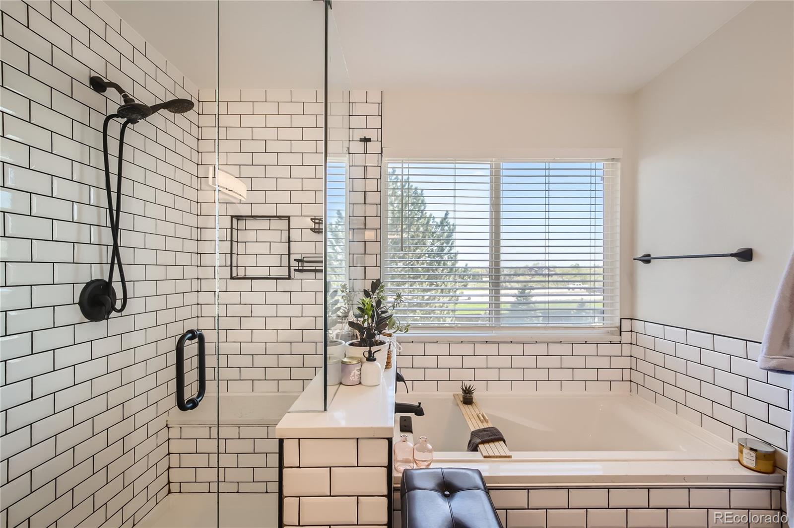 8481 West 95th Drive Westminster, CO 80021 - Photo 10 of 28 a bathroom with a bathtub and shower