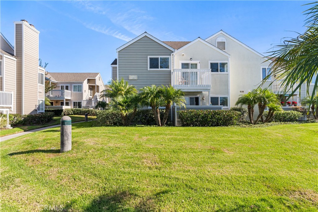 34002 Selva Road, Unit 369 Dana Point, CA 92629 - Photo 12 of 29 a front view of a house with a yard