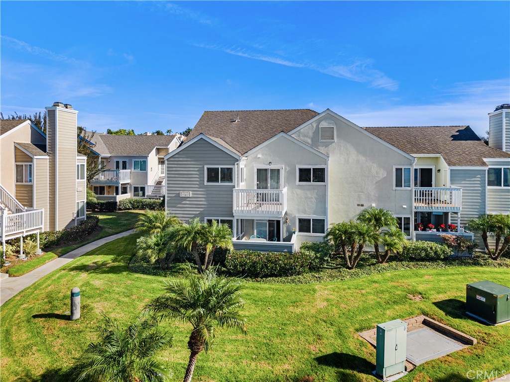 34002 Selva Road, Unit 369 Dana Point, CA 92629 - Photo 18 of 29 a front view of a house with a yard