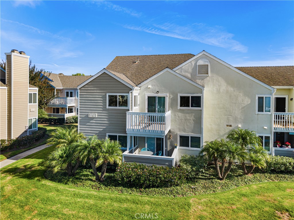 34002 Selva Road, Unit 369 Dana Point, CA 92629 - Photo 29 of 29 a front view of a house with a yard