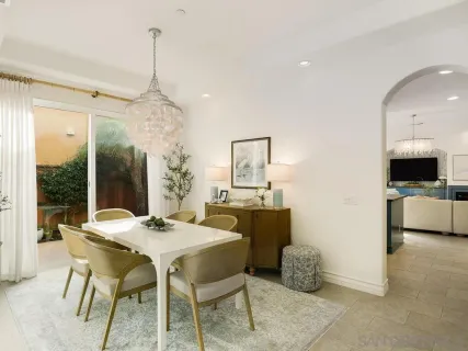a kitchen with stainless steel appliances granite countertop a sink and a stove