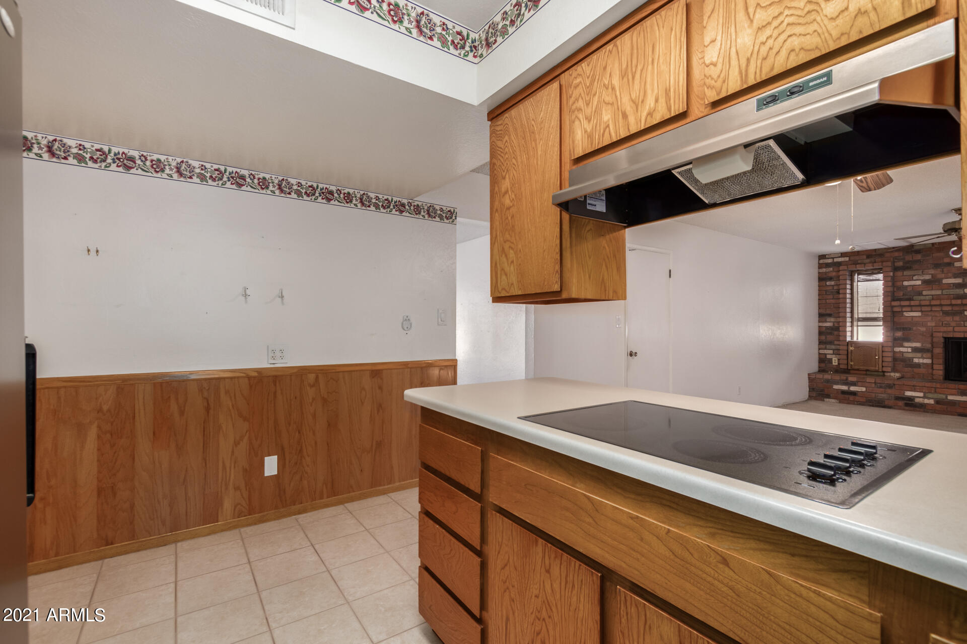 3308 South Newberry Road Tempe, AZ 85282 - Photo 17 of 38 a kitchen with a sink and cabinets