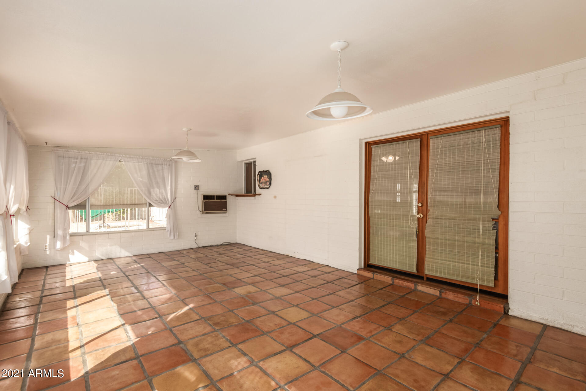 3308 South Newberry Road Tempe, AZ 85282 - Photo 26 of 38 a view of empty room with window and wooden floor