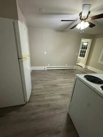 a view of a kitchen with a sink and dishwasher