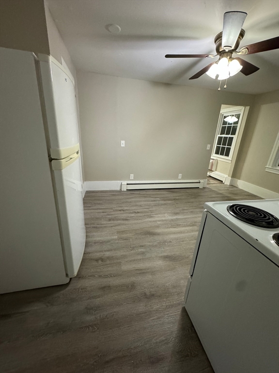 388 East Merrimack Street, Unit 2 Lowell, MA 01852 - Photo 7 of 9 a view of a kitchen with a sink and dishwasher