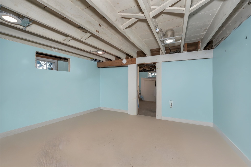 17 Roland Avenue Dracut, MA 01826 - Photo 26 of 37 a view of a room with an empty space