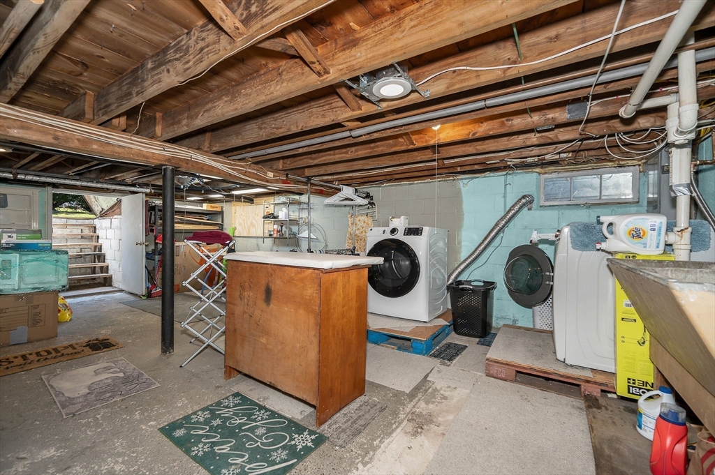 17 Roland Avenue Dracut, MA 01826 - Photo 28 of 37 a utility room with dryer and washer