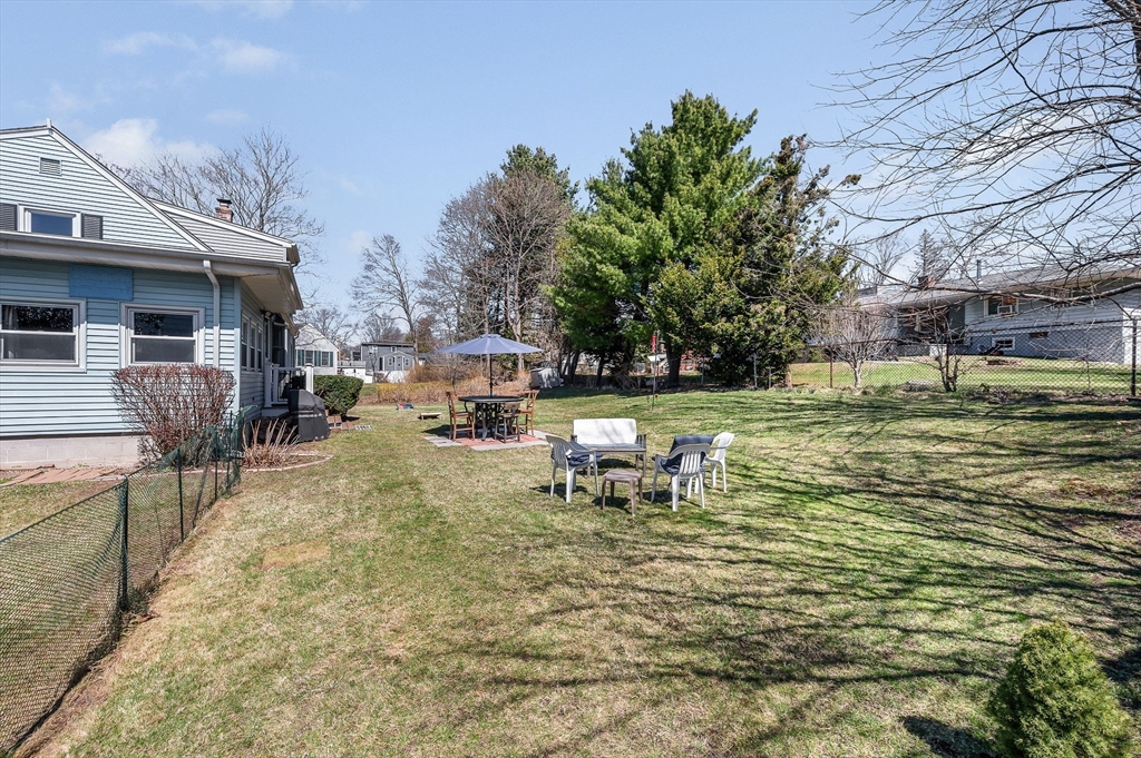 17 Roland Avenue Dracut, MA 01826 - Photo 31 of 37 a view of outdoor space with seating area