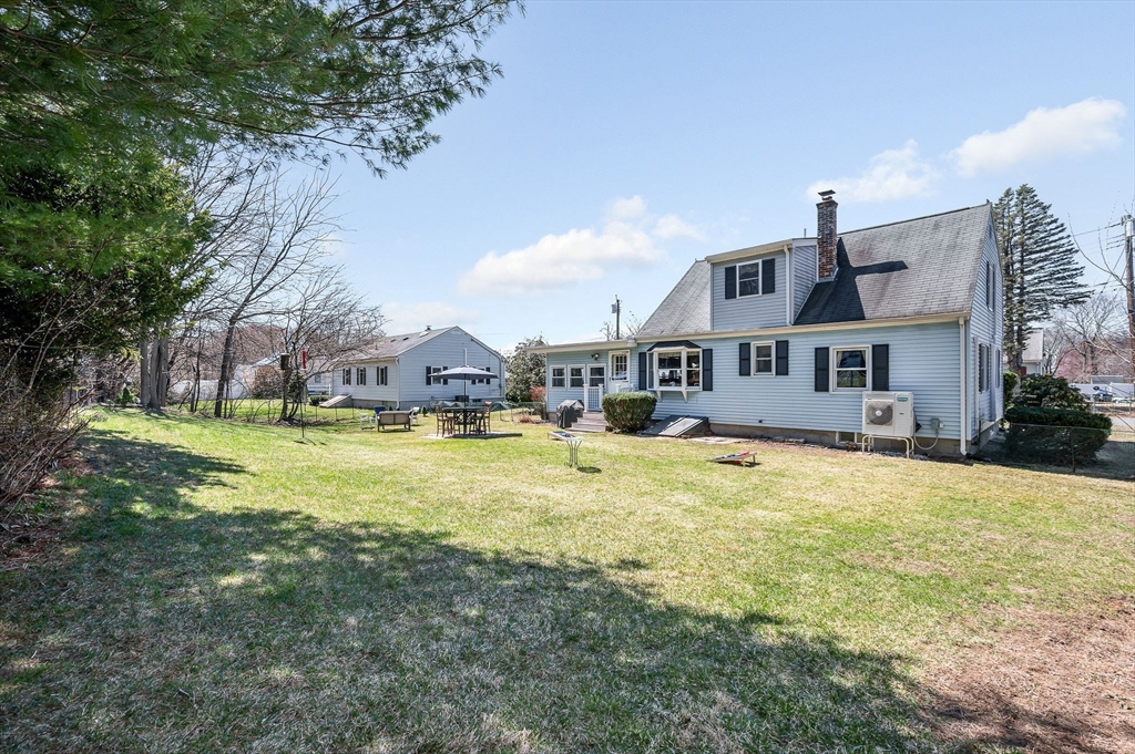 17 Roland Avenue Dracut, MA 01826 - Photo 34 of 37 a swimming pool view with a outdoor seating