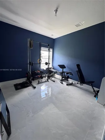 a view of a room with gym equipment