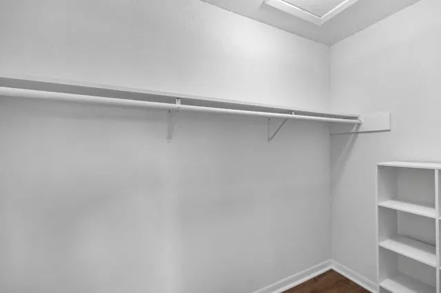 a view of an empty walk in closet