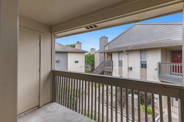 a view of a balcony from a balcony