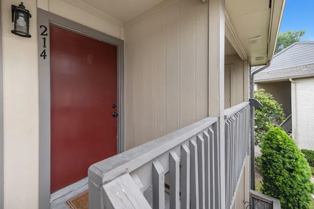 a view of a porch with seating space