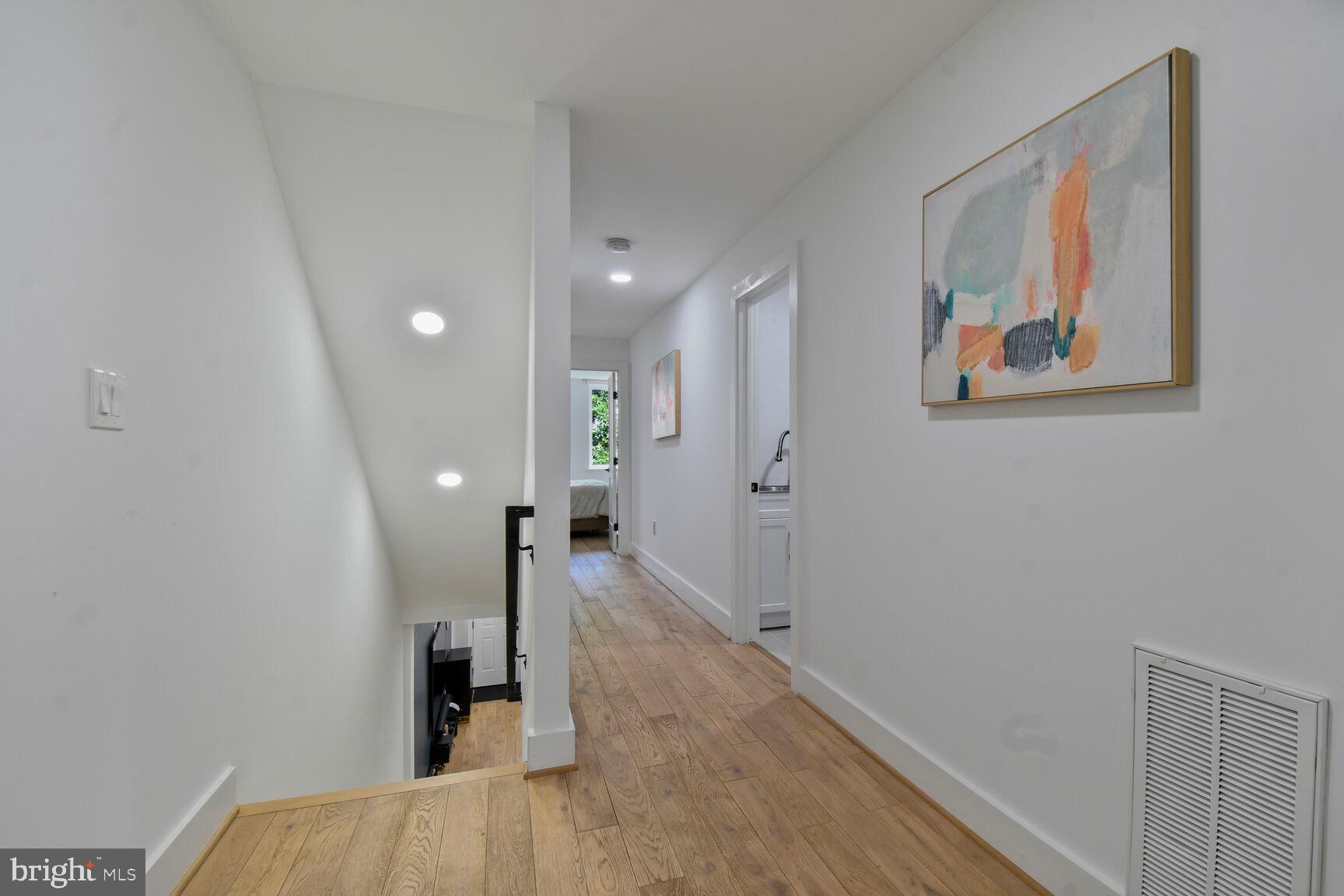 1427 K Street Southeast Washington, DC 20003 - Photo 16 of 30 a view of hallway with wooden floor
