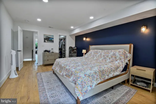 a bed room with a bed and a couch