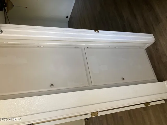 a view of wooden cabinets