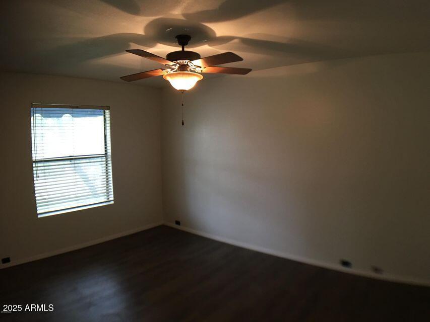 8634 South 51st Street, Unit 3 Phoenix, AZ 85044 - Photo 2 of 18 an empty room with a window