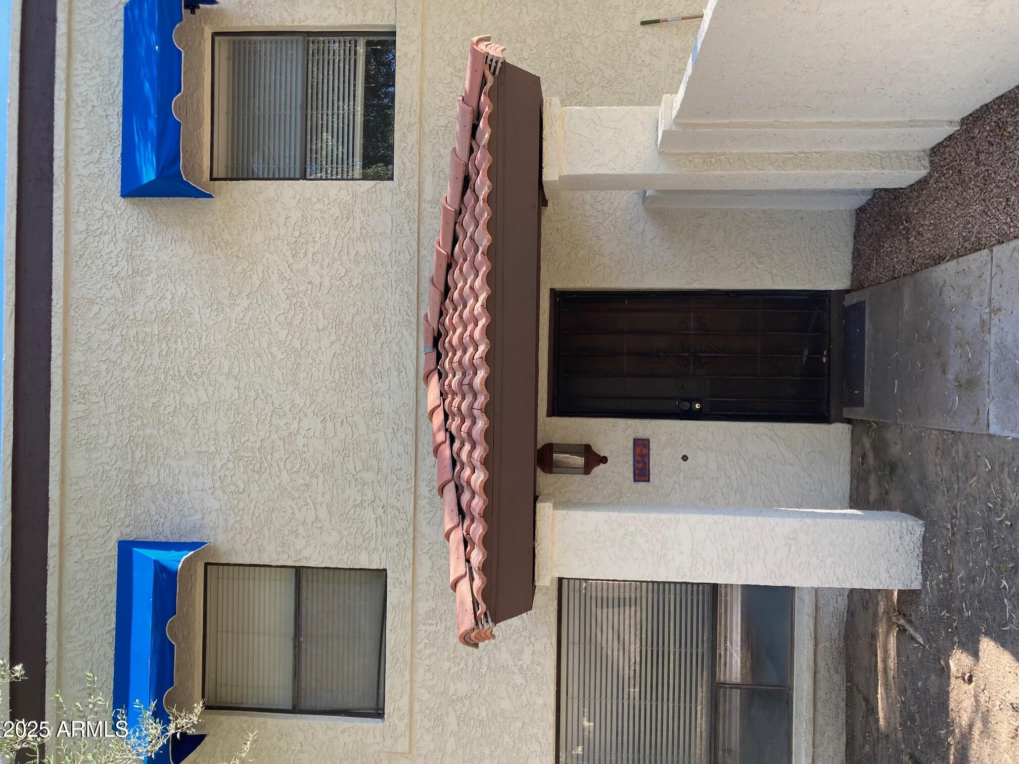 8634 South 51st Street, Unit 3 Phoenix, AZ 85044 - Photo 5 of 18 a bathroom with a sink and a mirror