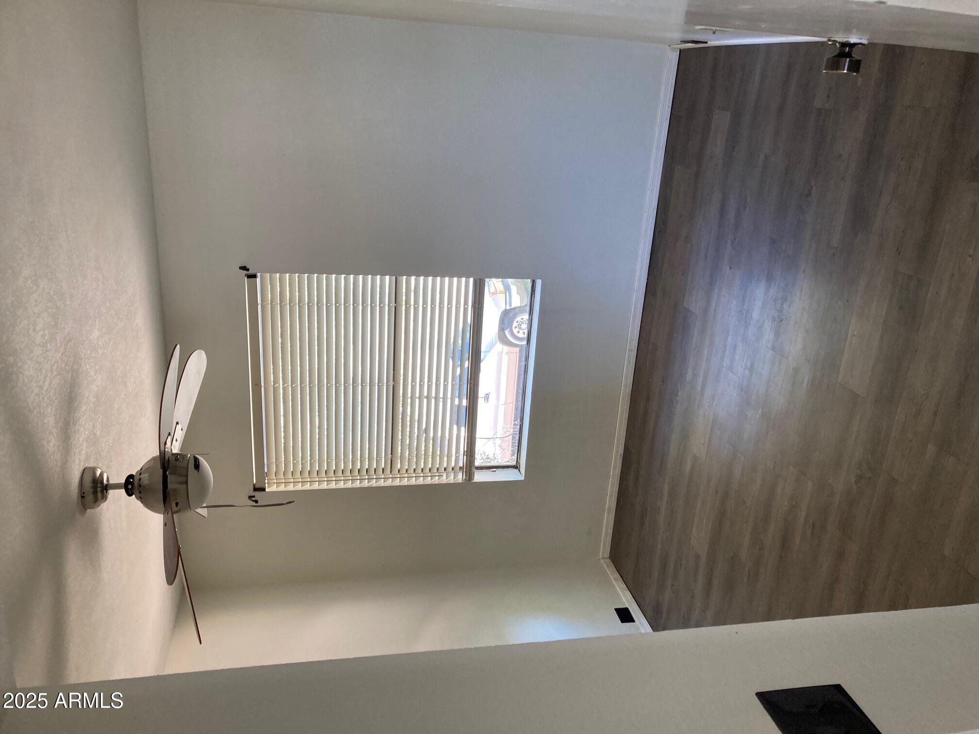 8634 South 51st Street, Unit 3 Phoenix, AZ 85044 - Photo 10 of 18 a view of a hallway with windows