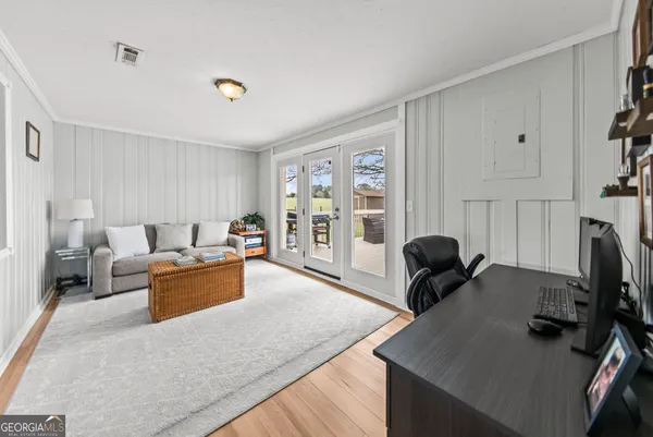 a bed room with a bed and a window