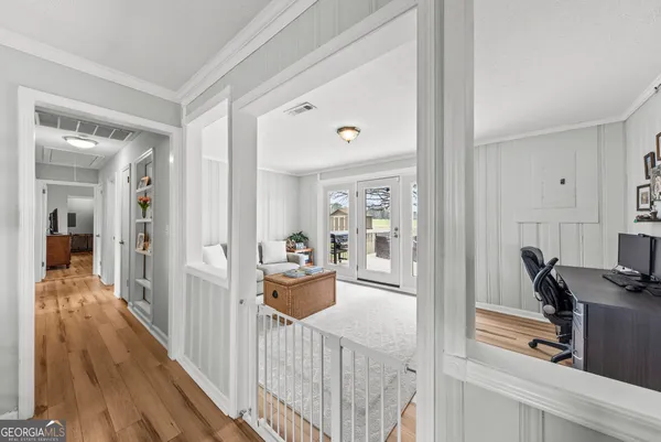 a white bath tub sitting next to a window