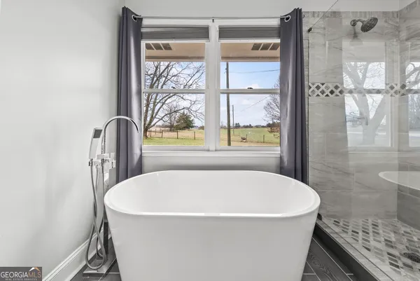 a view of lake with green field