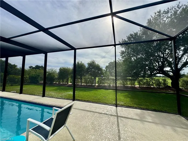a view of a patio with a backyard