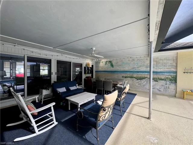 a outdoor space with lots of tables and chairs