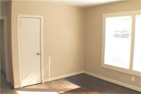 a view of an empty room and window