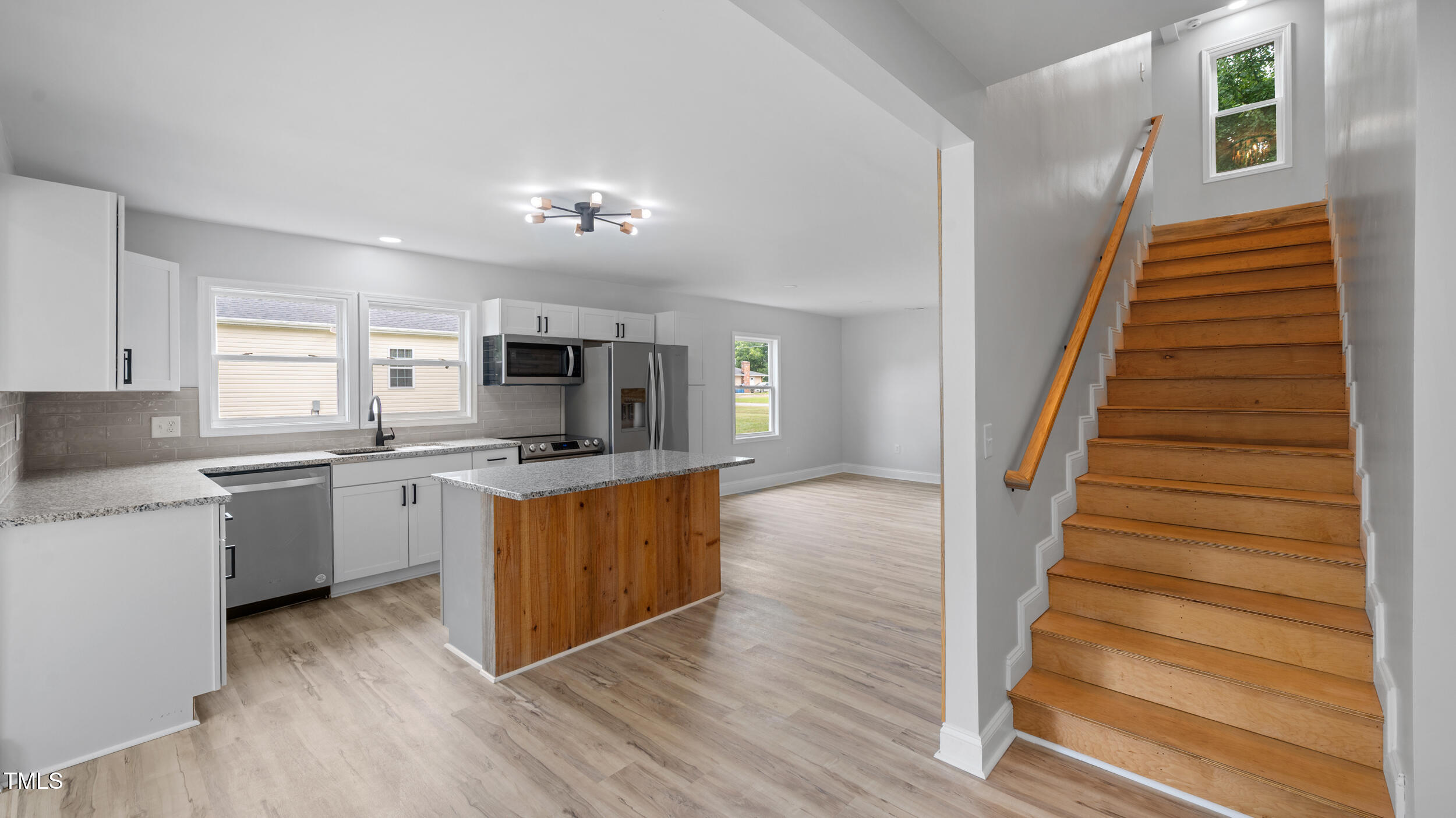 2634 William Allen Road Burlington, NC 27217 - Photo 11 of 37 a kitchen with sink microwave and stove