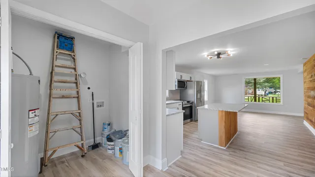 a view of a kitchen from the hallway