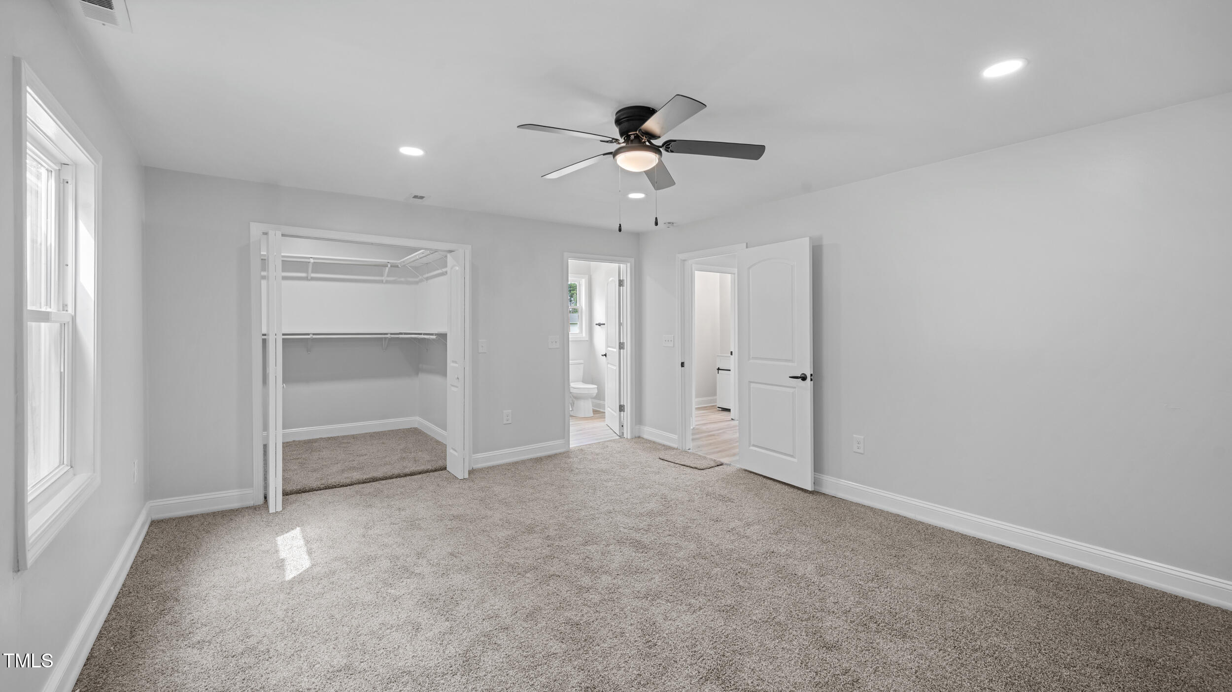 2634 William Allen Road Burlington, NC 27217 - Photo 14 of 37 an empty room with closet and windows