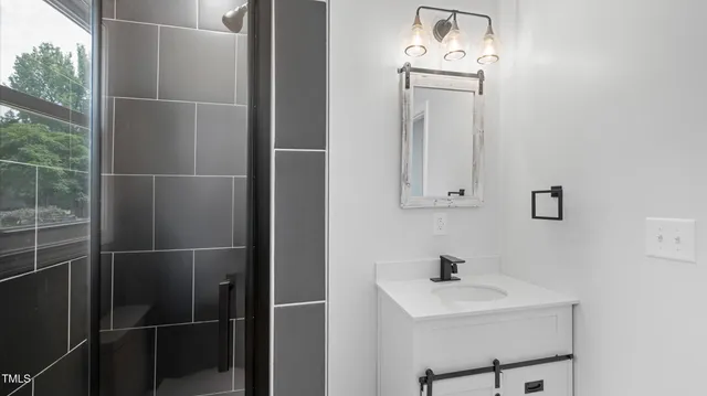 a bathroom with a sink toilet and vanity