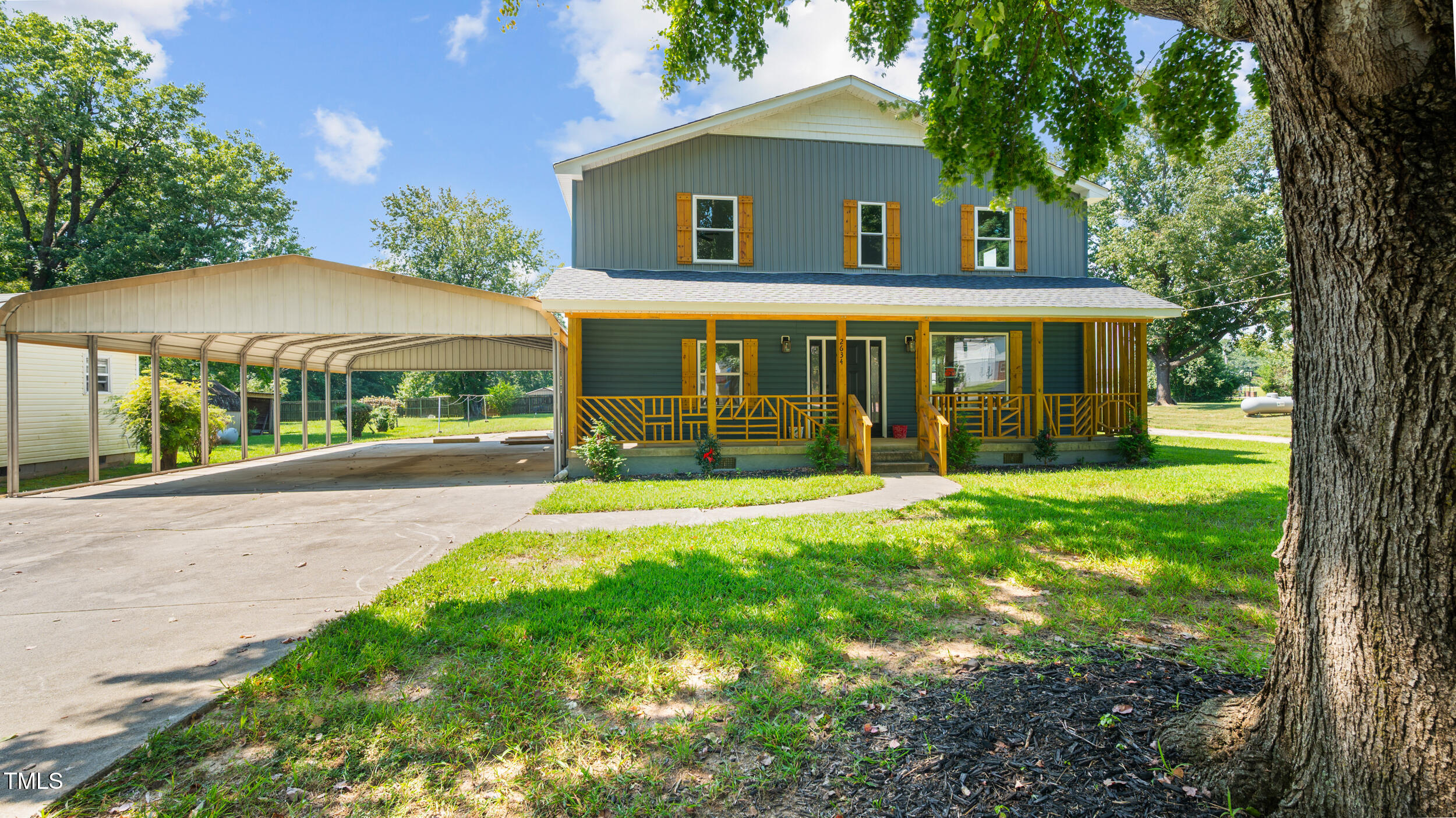 2634 William Allen Road Burlington, NC 27217 - Photo 34 of 37 a front view of a house with garden