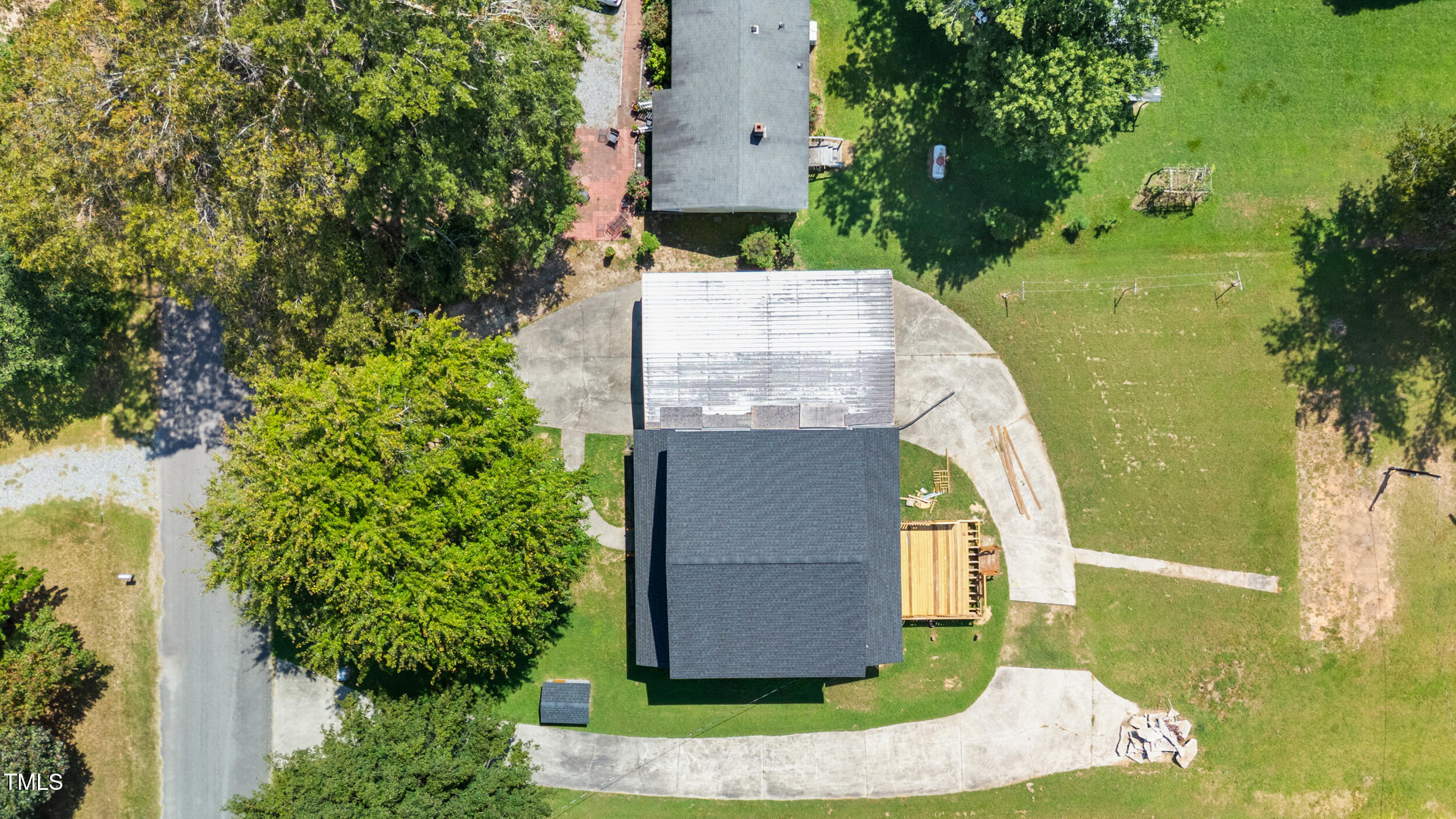 2634 William Allen Road Burlington, NC 27217 - Photo 37 of 37 an aerial view of a house with garden space and swimming pool