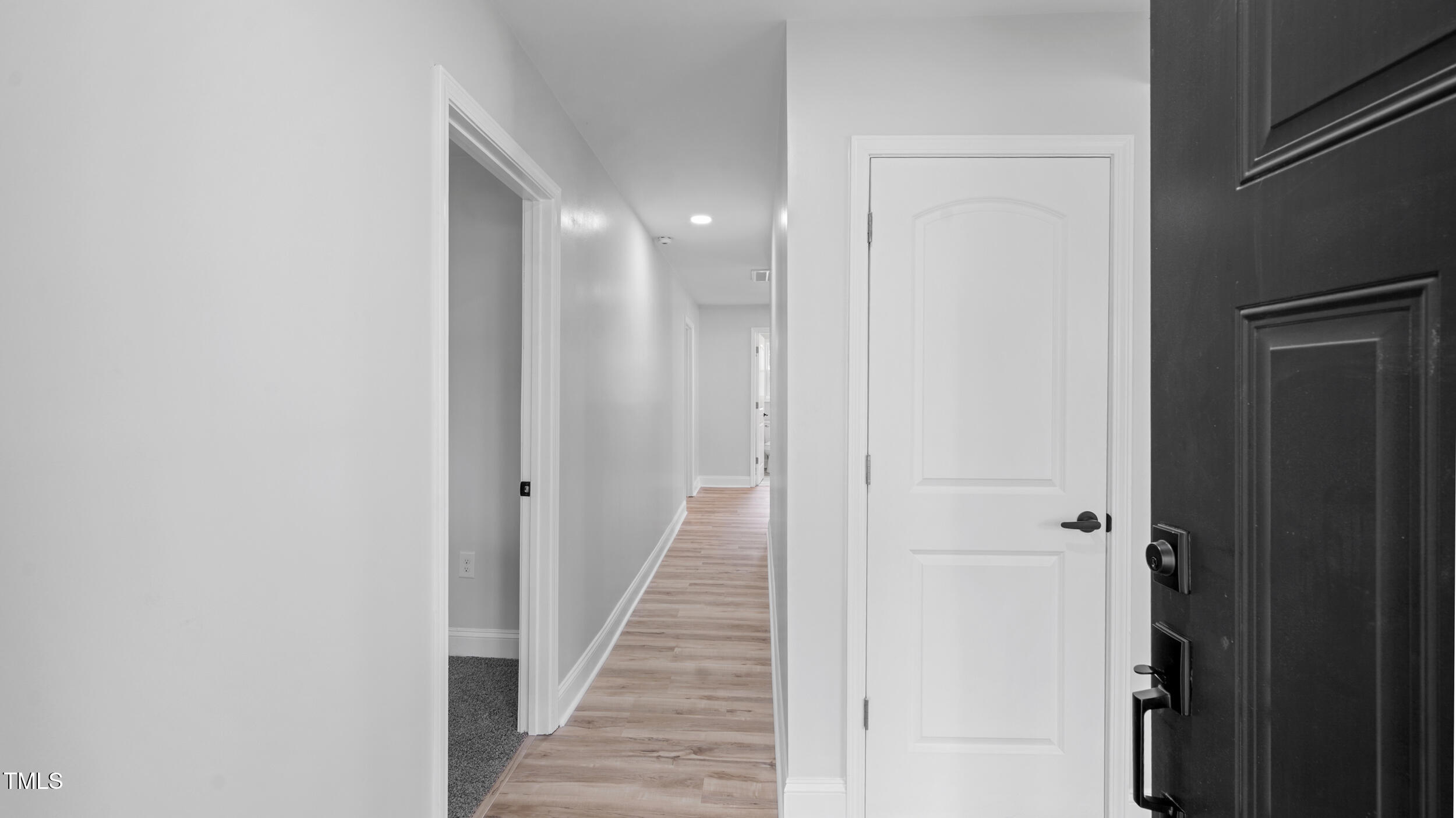 2634 William Allen Road Burlington, NC 27217 - Photo 4 of 37 a view of a hallway with wooden floor and staircase