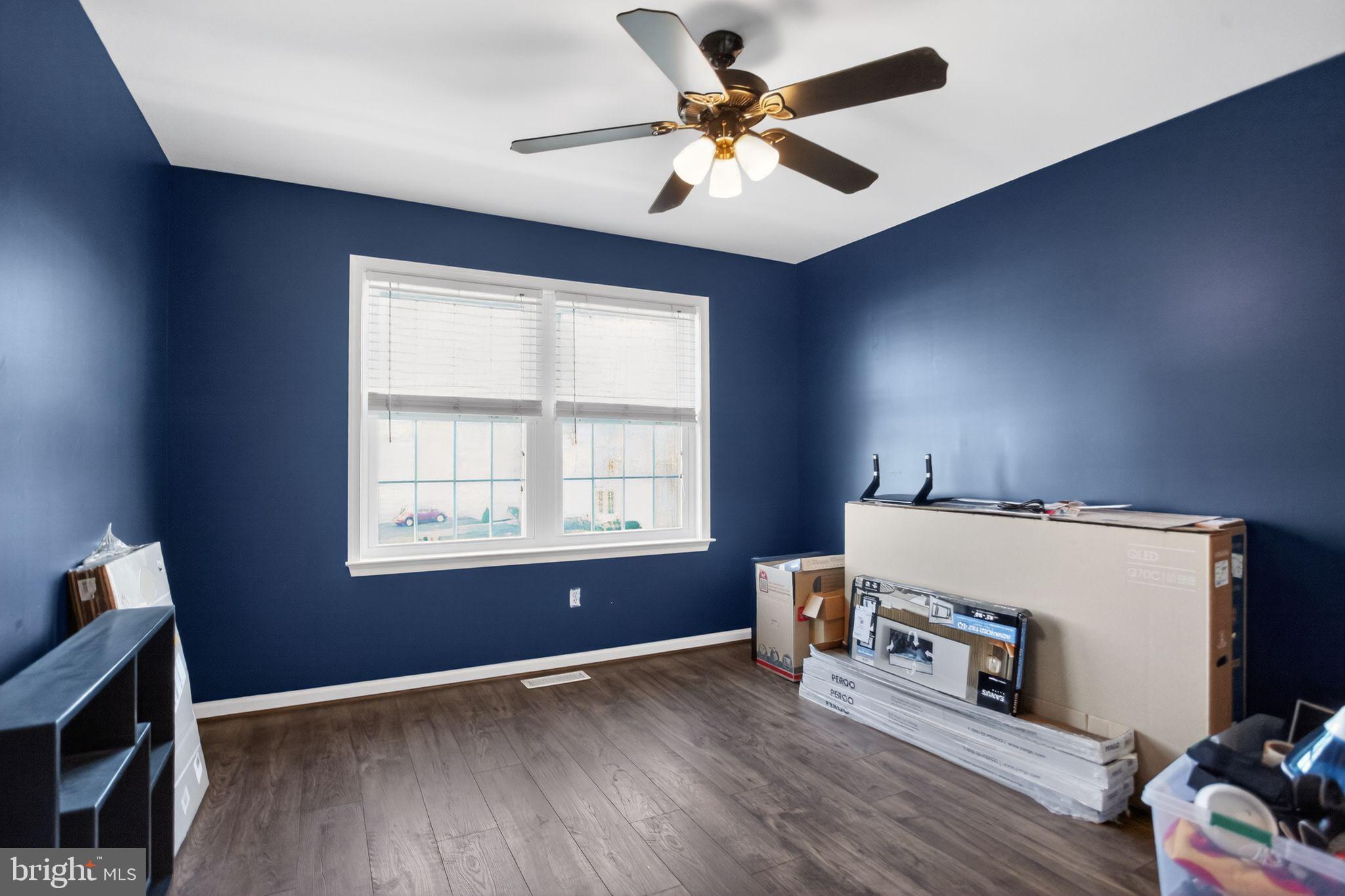 201 Victoria Court Ambler, PA 19002 - Photo 23 of 36 an empty room with wooden floor and windows