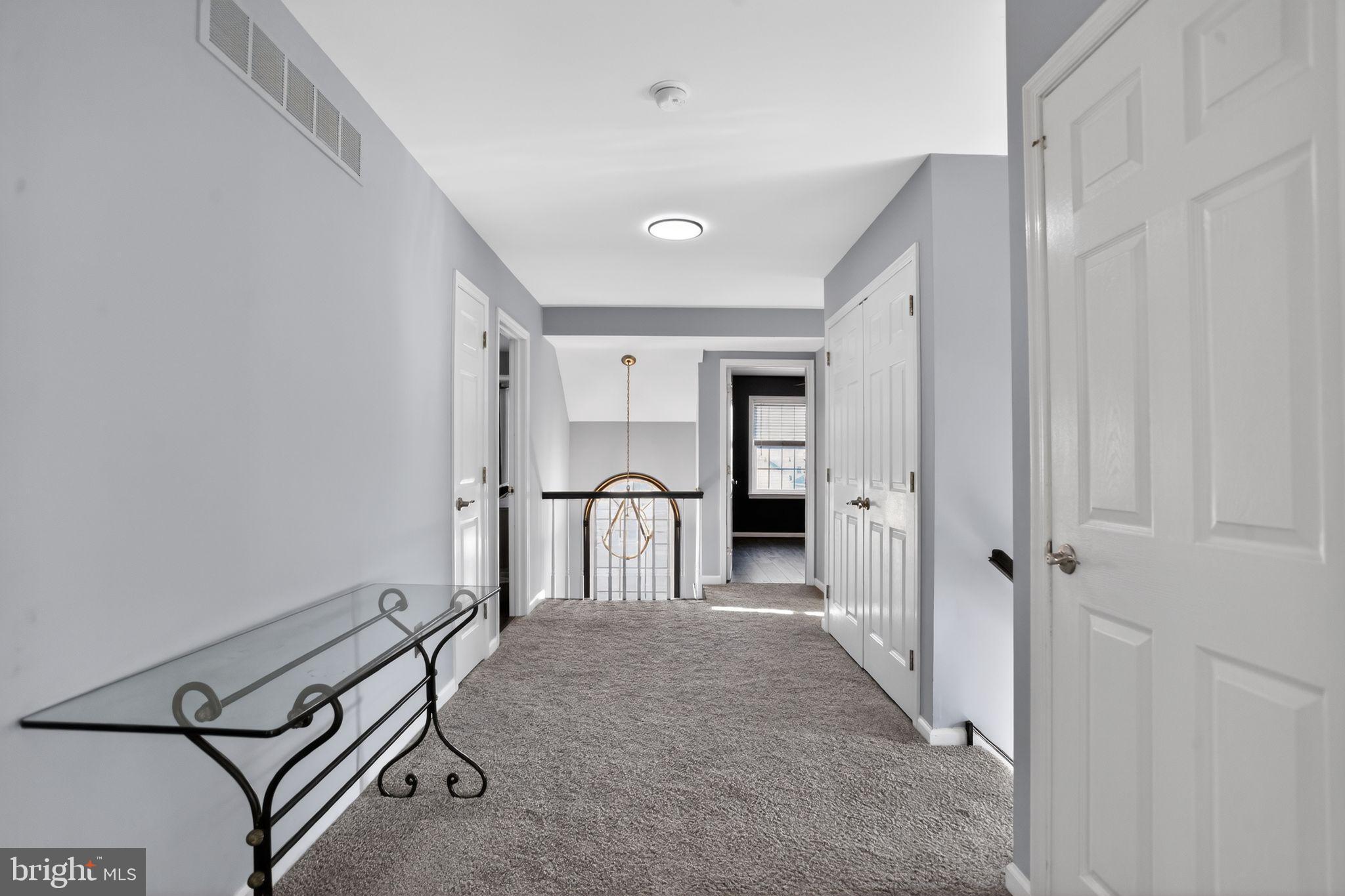 201 Victoria Court Ambler, PA 19002 - Photo 26 of 36 a view of a hallway with closet