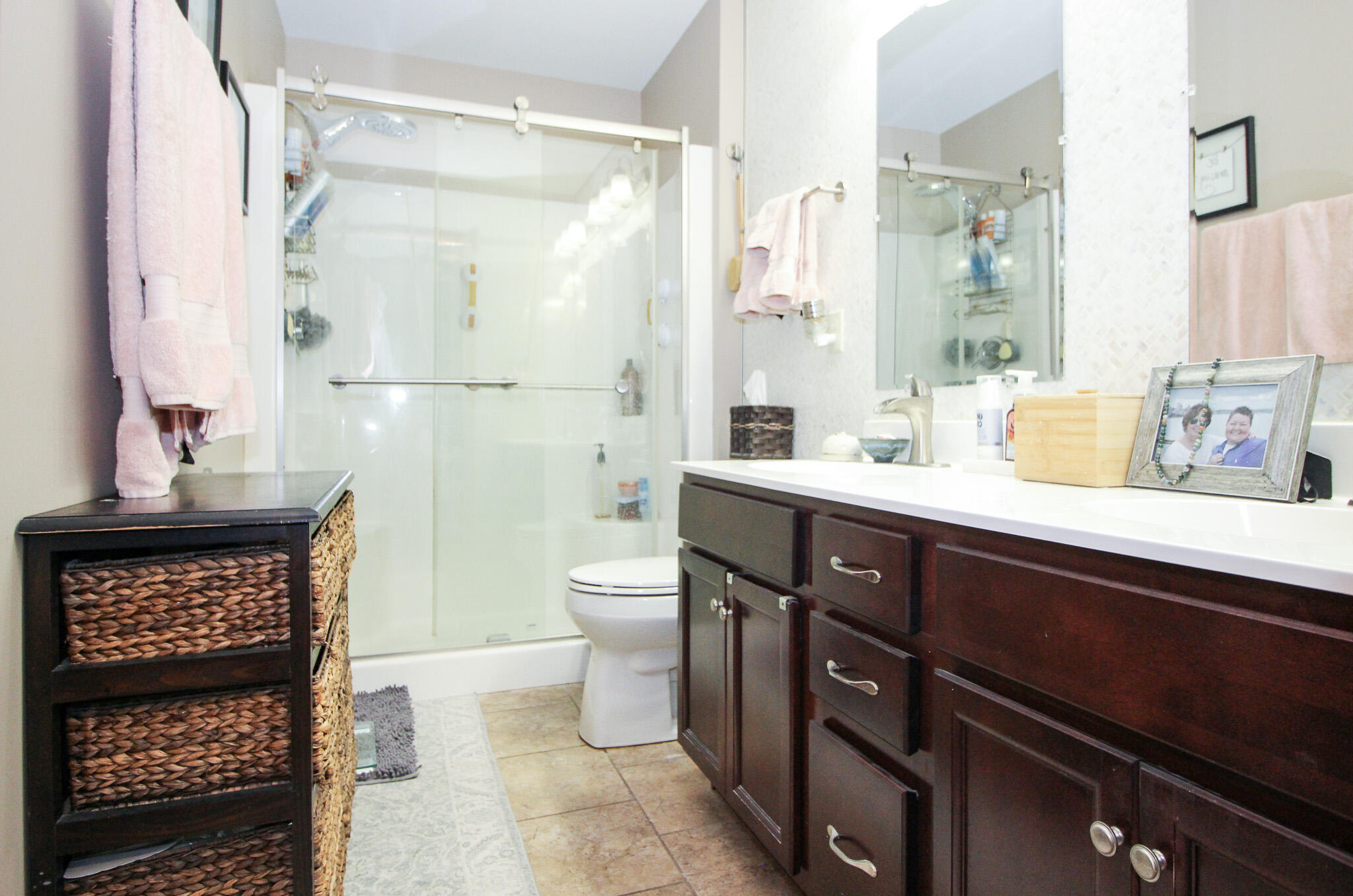 2913 Cardinal Drive Wheatfield, IN 46392 - Photo 18 of 34 a bathroom with a sink a toilet and shower