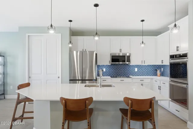 a bedroom with a bed furniture and a window