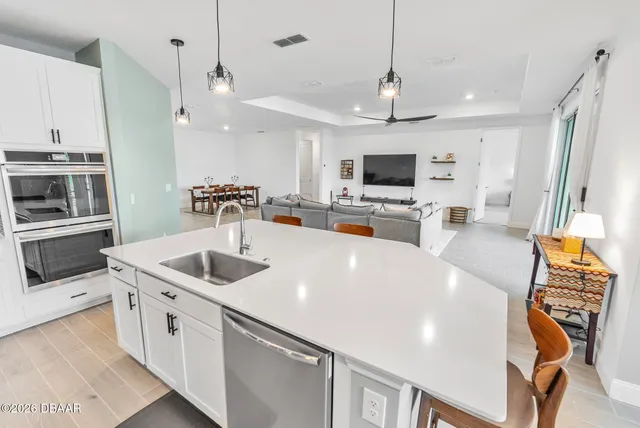 a bathroom with a shower and a glass door