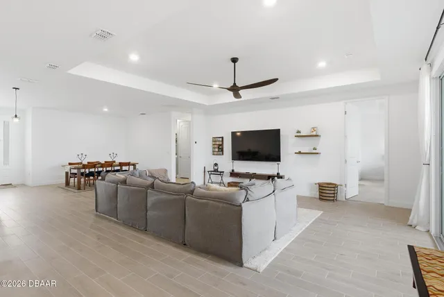 a bedroom with a bed and a chair