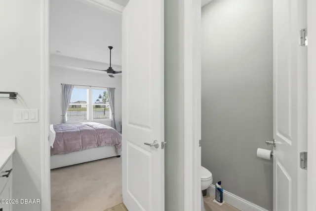 a living room with couch and a window