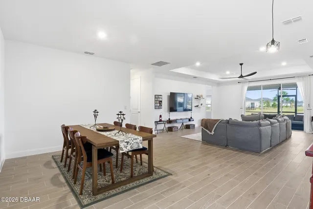 a view of a lake with houses in the background