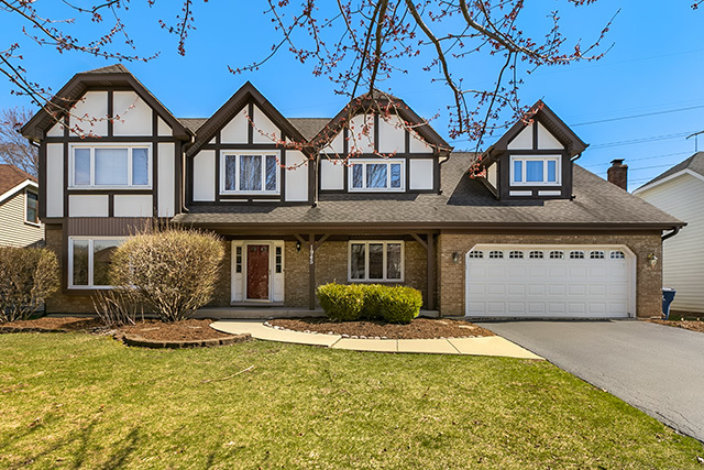 1945 Slippery Rock Road Naperville, IL 60565 - Photo 1 of 35 a front view of a house with a yard